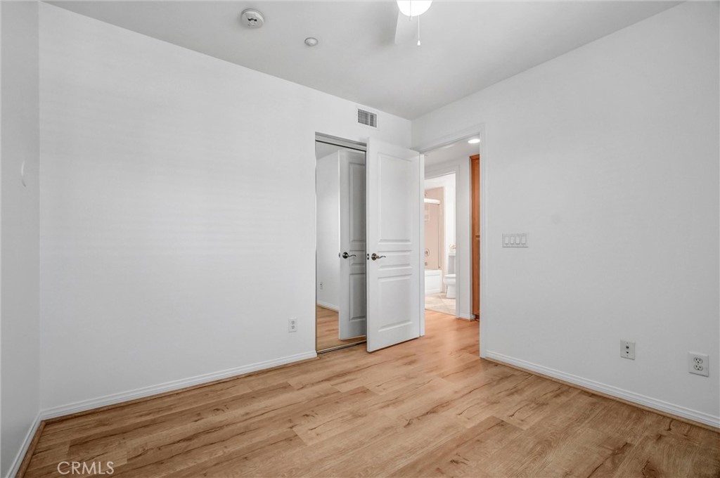 12 Shellprint Court Newport Beach, CA 92663 - Photo 33 of 42 Bedroom #3 with mirrored wardrobes