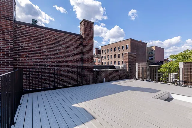 a front view of a building with street view