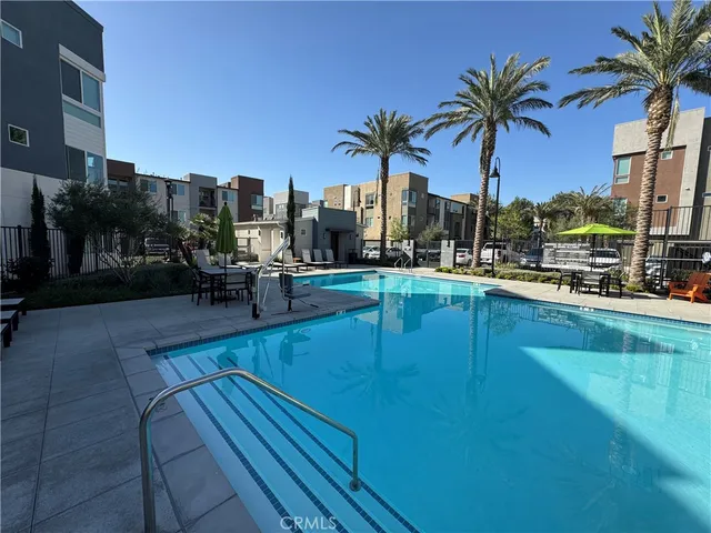 a view of a chairs and table in a patio of the house