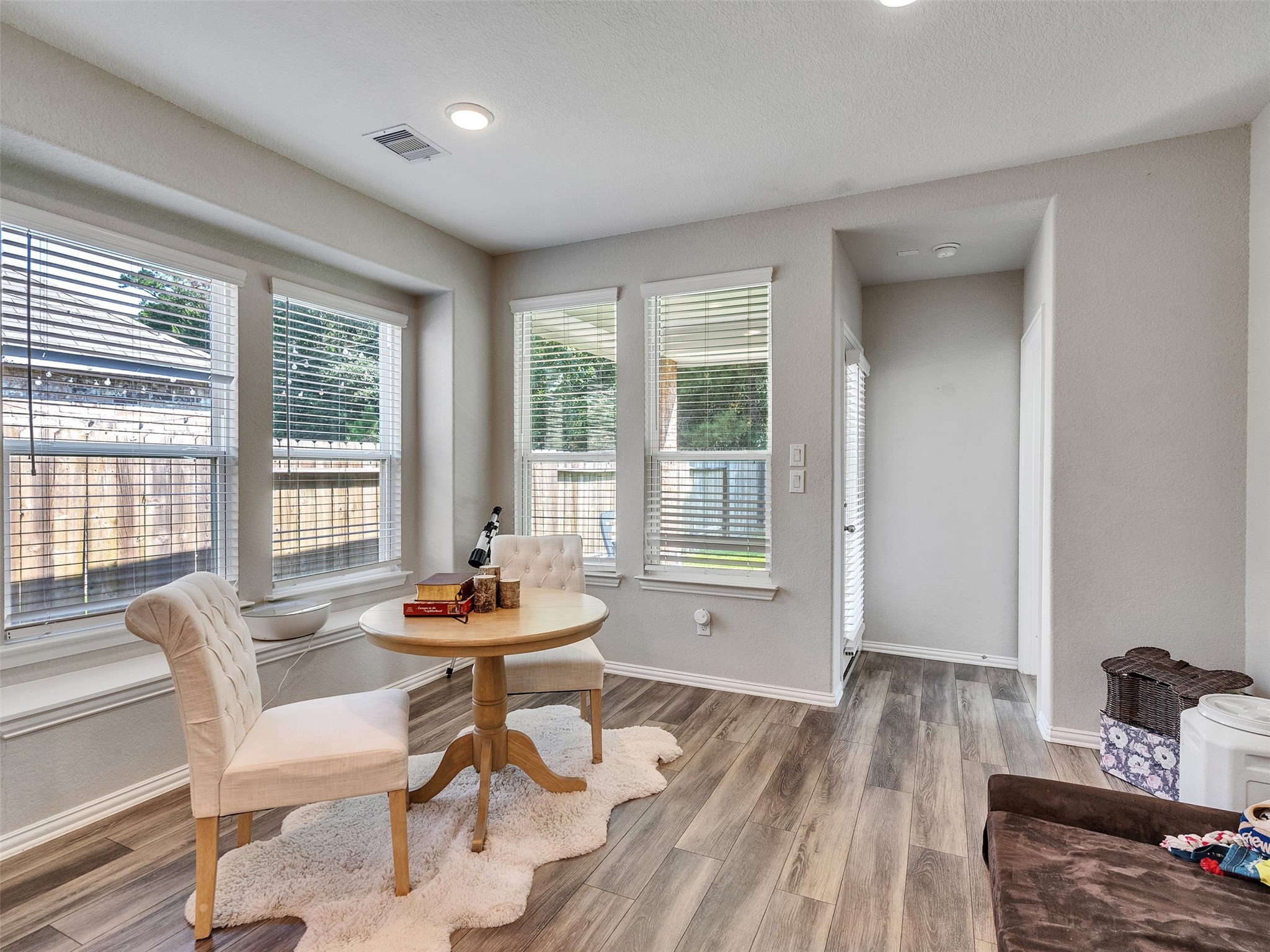 29859 Woodsons Edge Way Spring, TX 77386 - Photo 15 of 36 Cozy breakfast room with a beautiful relaxing view of the backyard