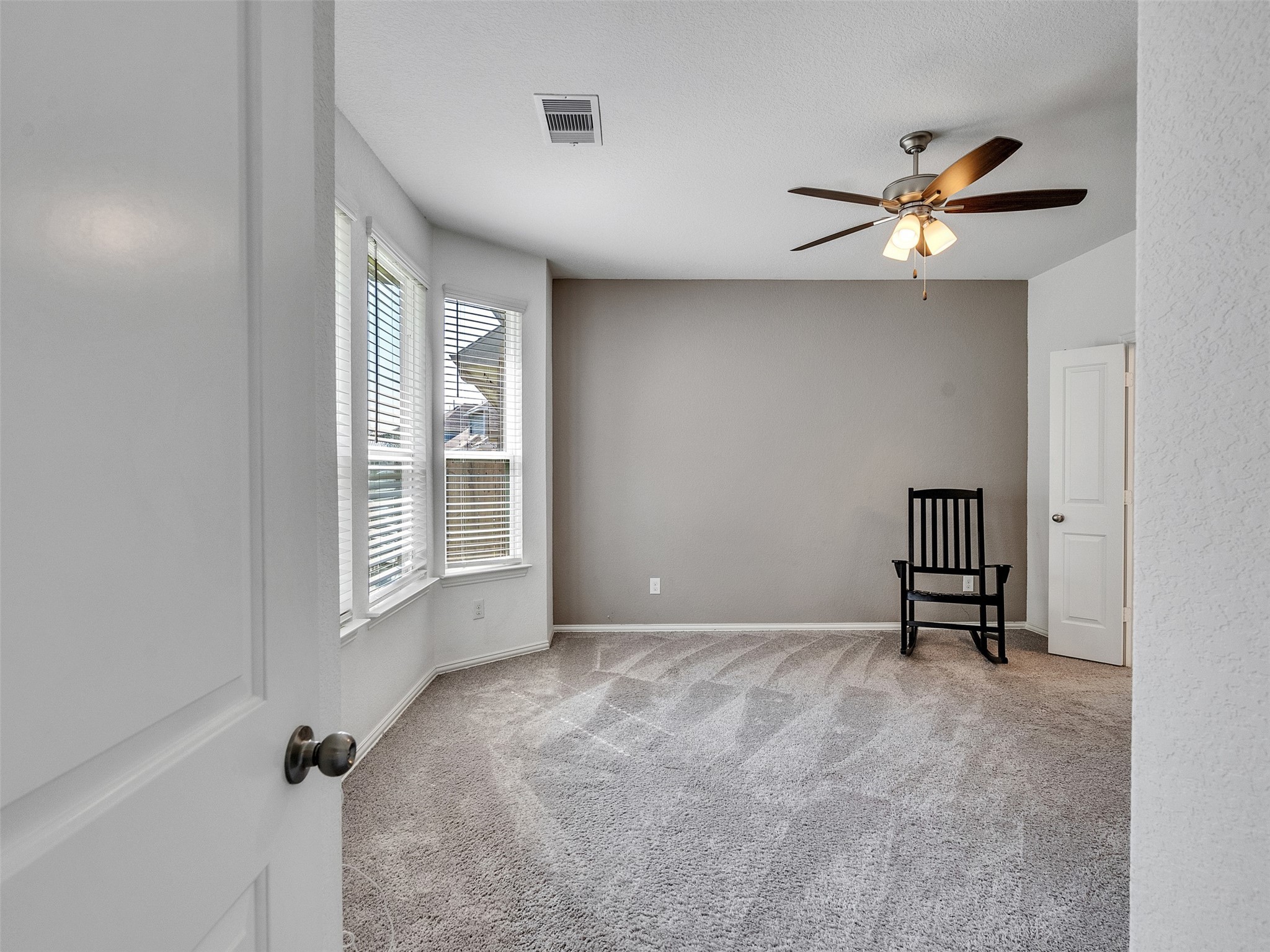 29859 Woodsons Edge Way Spring, TX 77386 - Photo 21 of 36 Primary bedroom with a view to the backyard