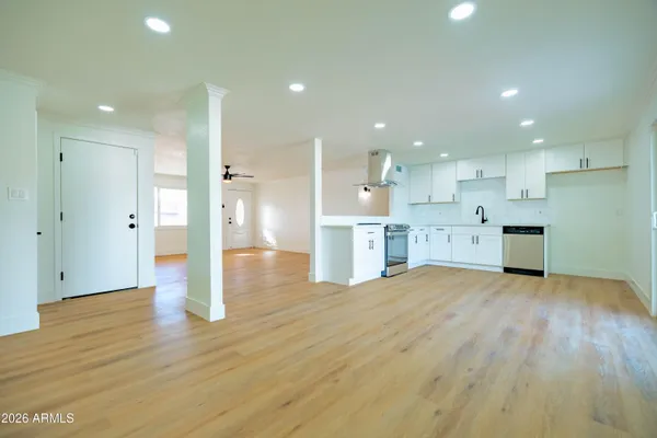 a view of kitchen with wooden floor