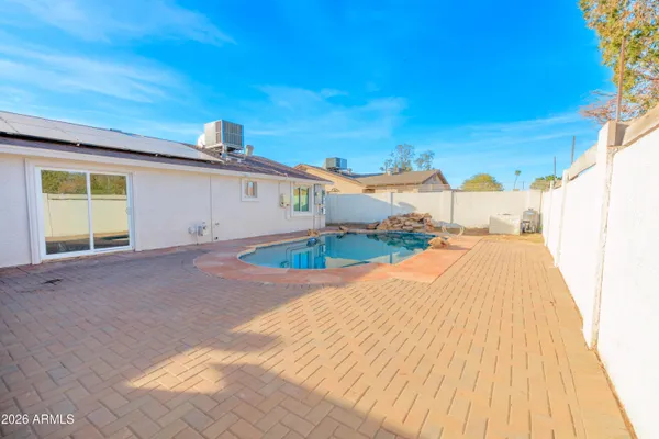 a view of a house with a patio