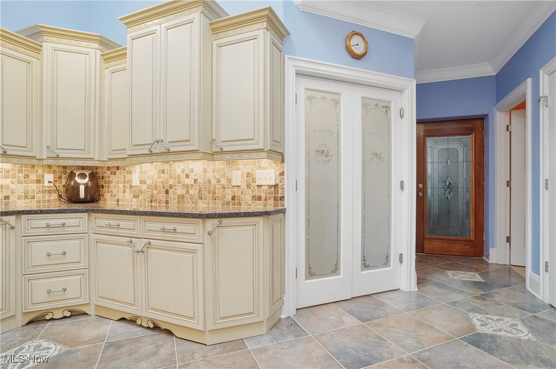 8555 Cable Line Road Ravenna, OH 44266 - Photo 19 of 50 White doors lead to a beautiful walk in pantry.