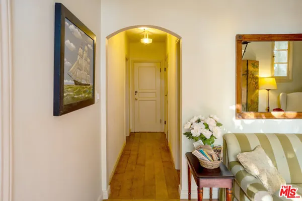 a view of entryway with wooden floor