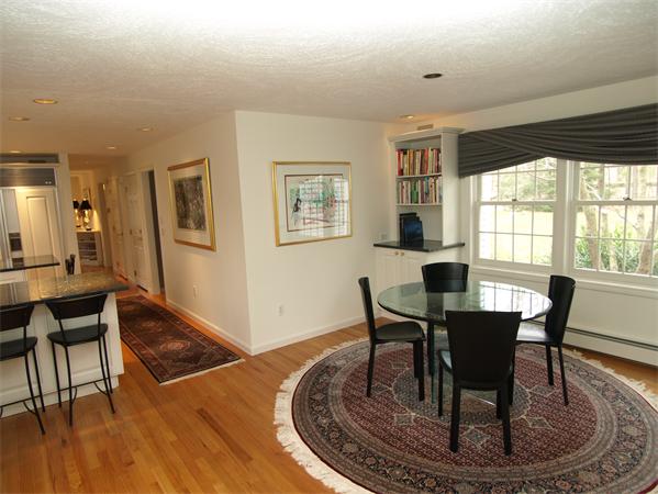 108 West Berlin Road Bolton, MA 01740 - Photo 4 of 25 a view of a dining room with furniture window and wooden floor
