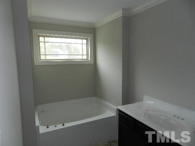 430 Fieldtrial Circle Garner, NC 27529 - Photo 12 of 23 a bath tub sitting next to a window