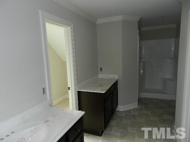 430 Fieldtrial Circle Garner, NC 27529 - Photo 13 of 23 a bathroom with a sink and a mirror