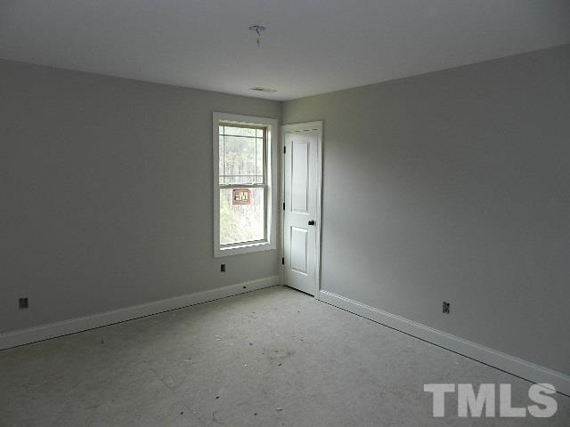 430 Fieldtrial Circle Garner, NC 27529 - Photo 15 of 23 an empty room with windows