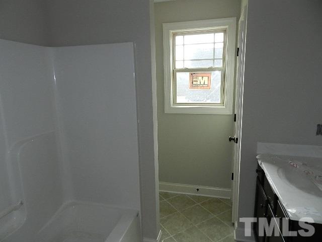 430 Fieldtrial Circle Garner, NC 27529 - Photo 18 of 23 a bathroom with a window