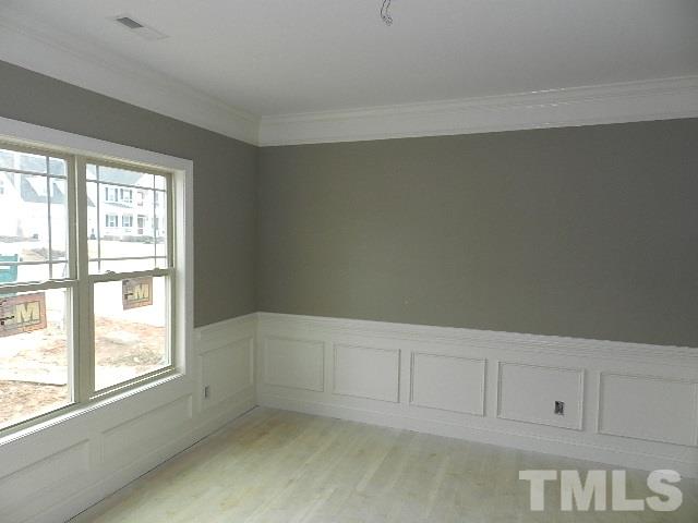 430 Fieldtrial Circle Garner, NC 27529 - Photo 3 of 23 an empty room with cabinet