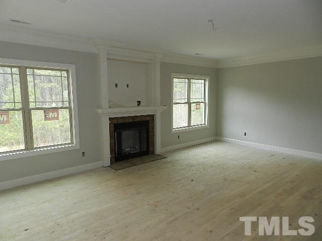 430 Fieldtrial Circle Garner, NC 27529 - Photo 7 of 23 an empty room with windows