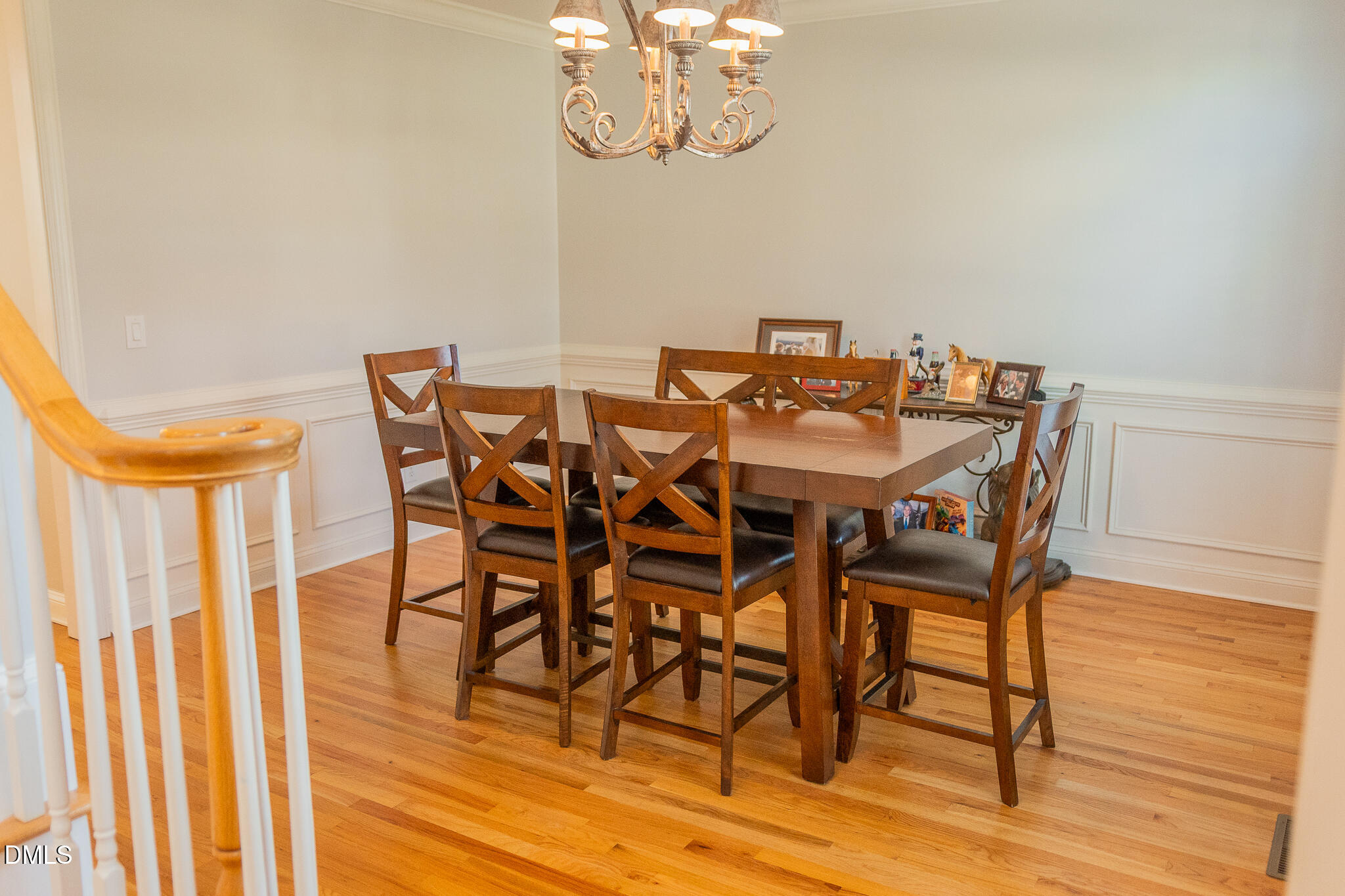 12324 Canolder Street Raleigh, NC 27614 - Photo 17 of 64 a view of a dining room with furniture and wooden floor