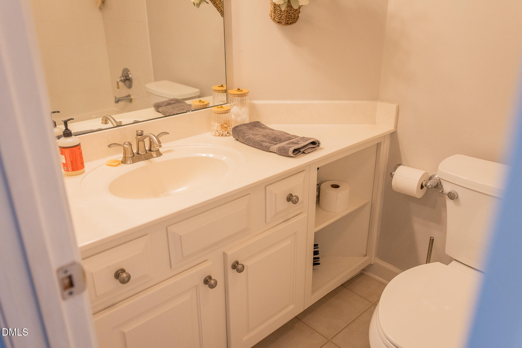 12324 Canolder Street Raleigh, NC 27614 - Photo 30 of 64 a bathroom with a sink and a toilet