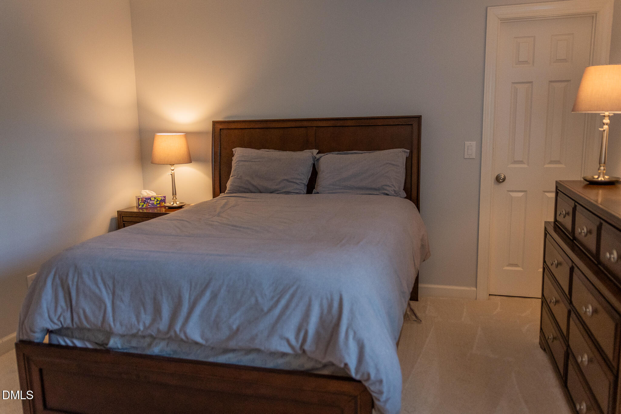 12324 Canolder Street Raleigh, NC 27614 - Photo 31 of 64 a bedroom with a bed and a night stand