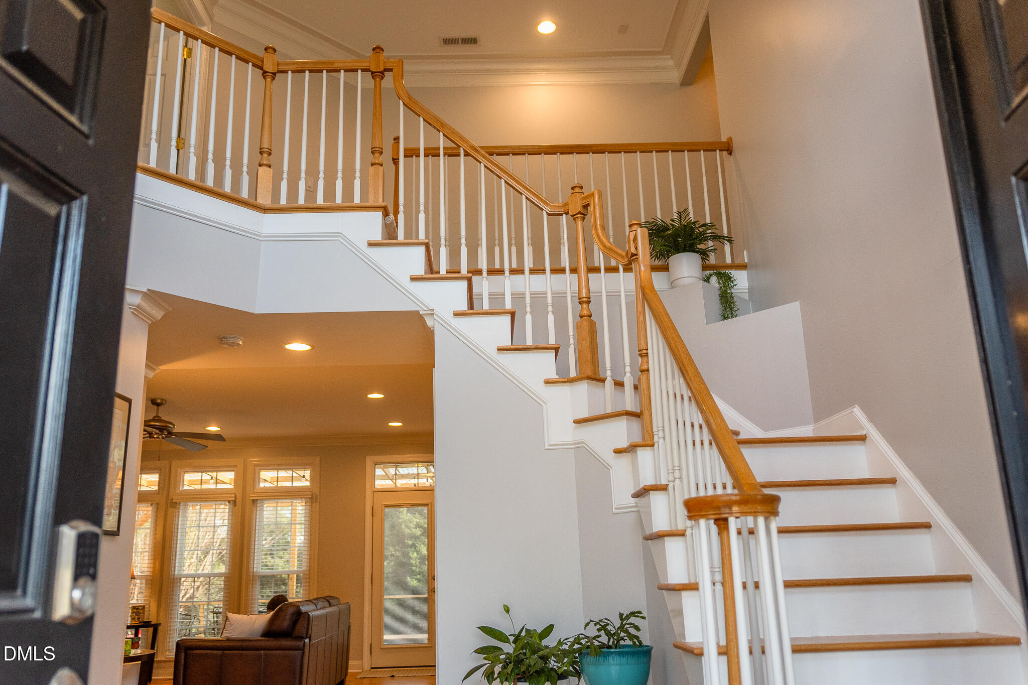 12324 Canolder Street Raleigh, NC 27614 - Photo 5 of 64 a view of entryway and hall with wooden floor