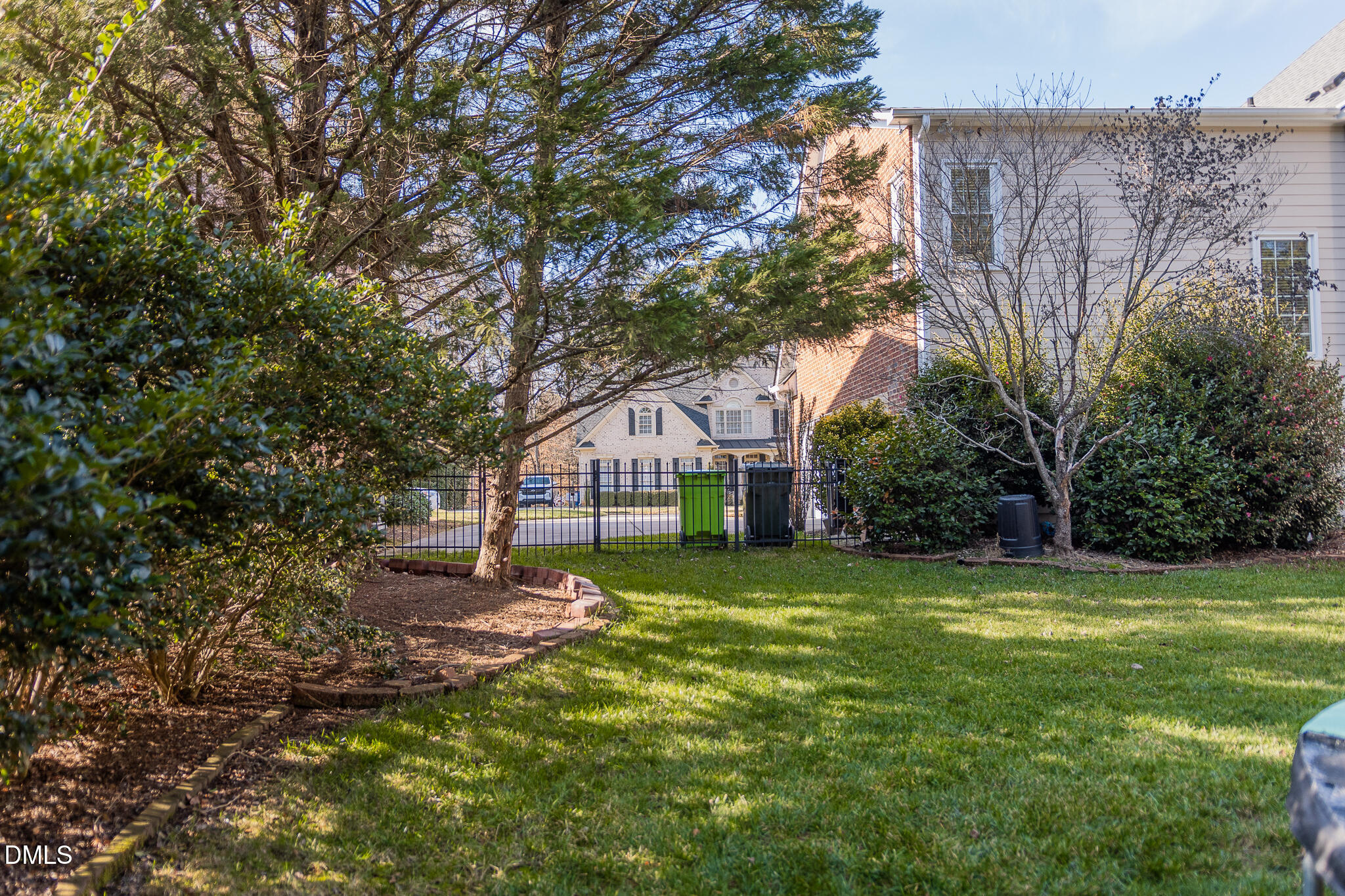 12324 Canolder Street Raleigh, NC 27614 - Photo 53 of 64 a house with a tree in front of it