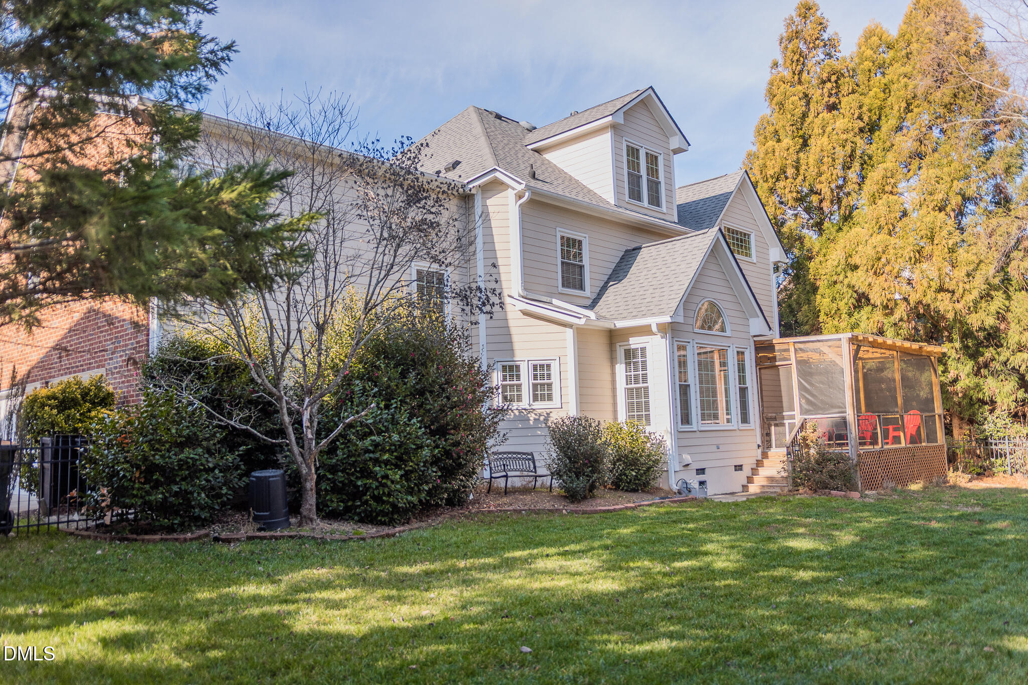 12324 Canolder Street Raleigh, NC 27614 - Photo 54 of 64 a front view of a house with a garden
