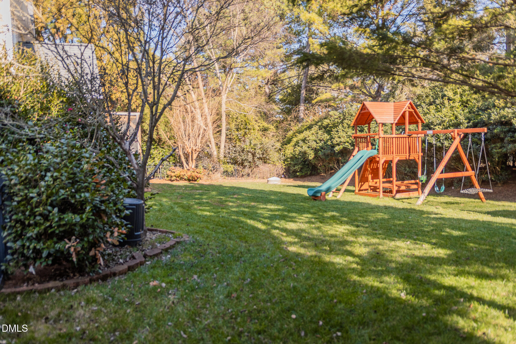12324 Canolder Street Raleigh, NC 27614 - Photo 56 of 64 a view of an house with backyard and a tree