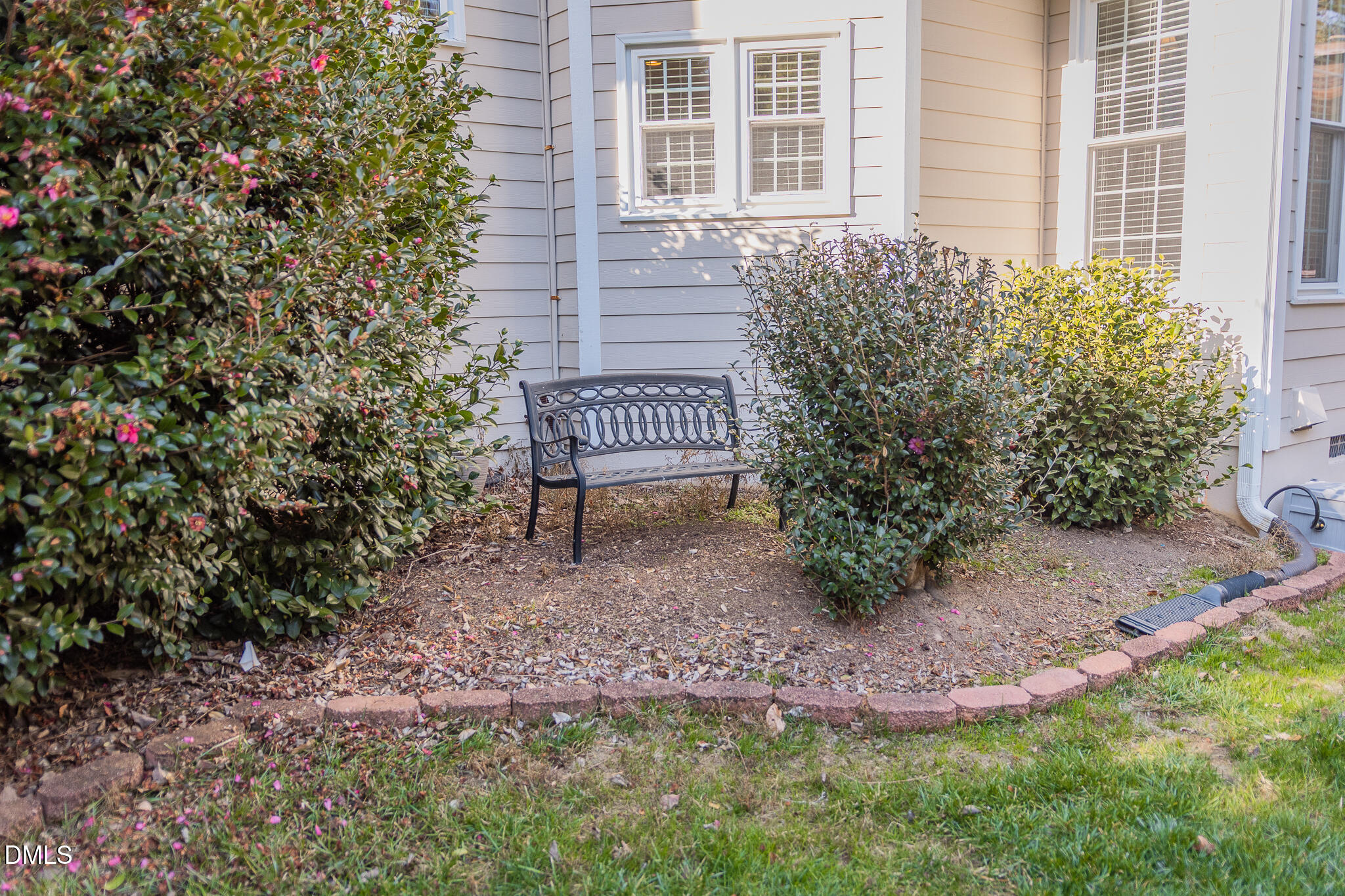 12324 Canolder Street Raleigh, NC 27614 - Photo 58 of 64 a view of a house with a yard and sitting area