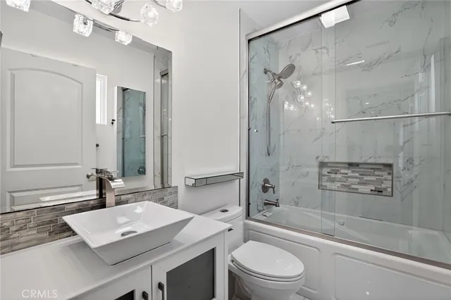 an aerial view of a city with lots of residential buildings