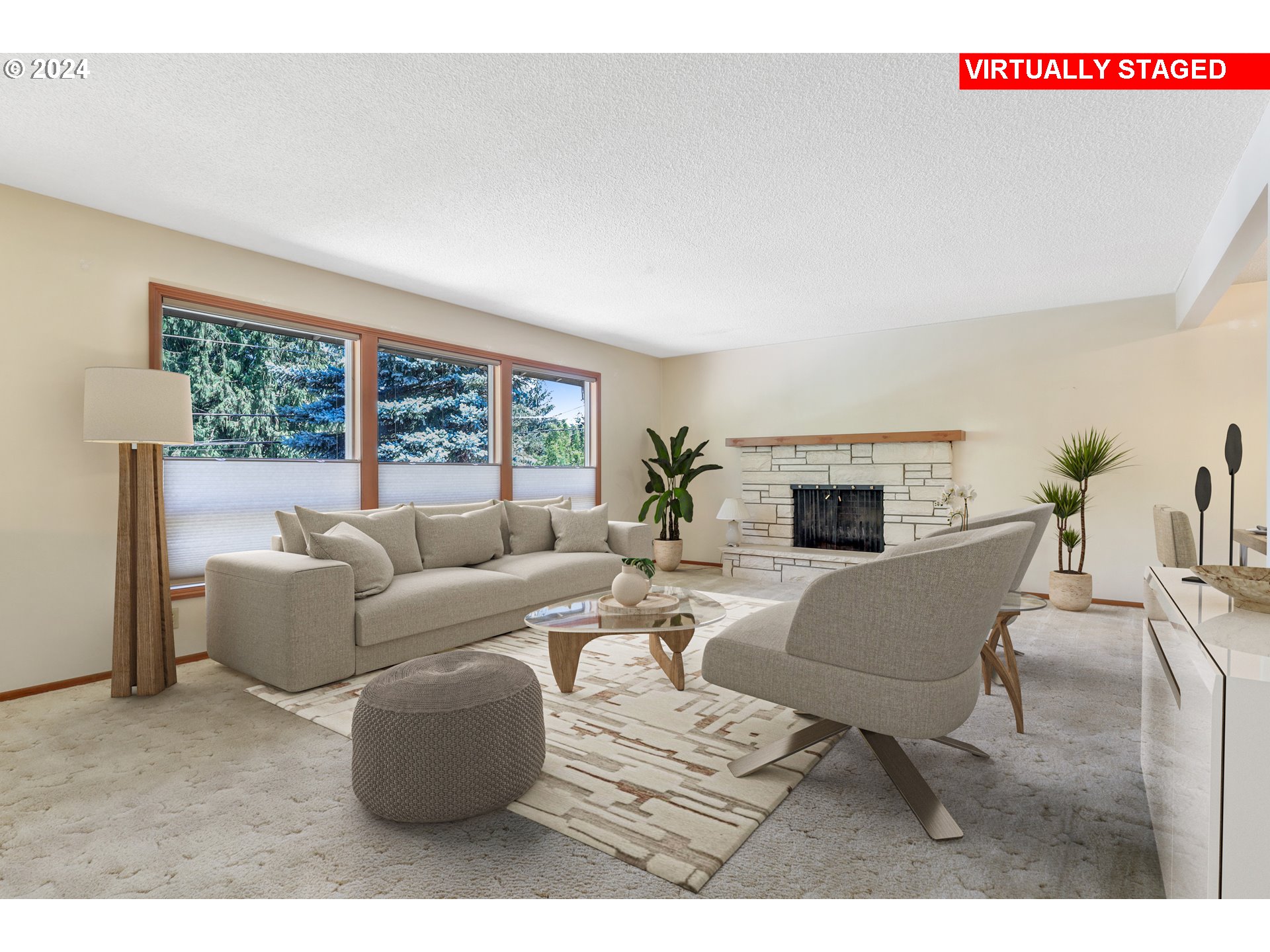 7130 Southwest Locust Street Portland, OR 97223 - Photo 2 of 28 a living room with furniture a fireplace and a large window