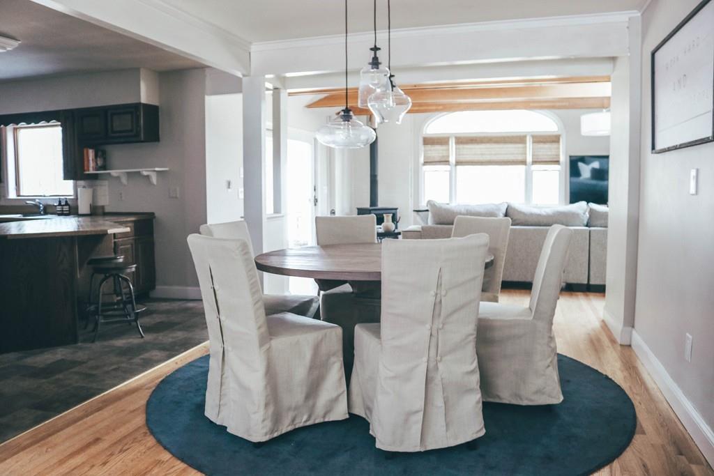 26 Nutting Road Groton, MA 01450 - Photo 6 of 18 a view of a dining room with furniture window and wooden floor