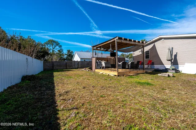a house view with a garden space