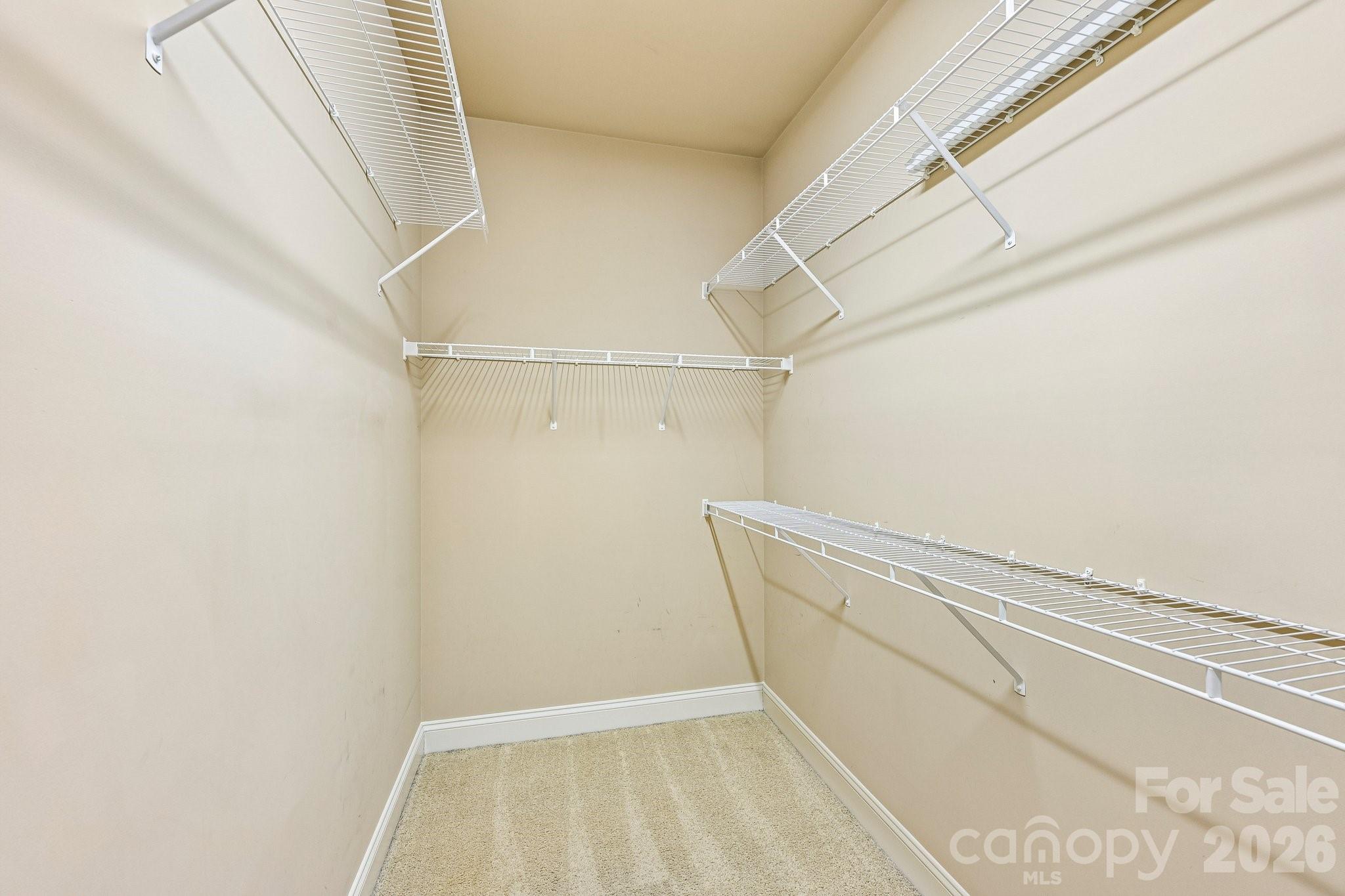 624 Hunley Street Monroe, NC 28112 - Photo 18 of 36 a view of a room with racks on the wall