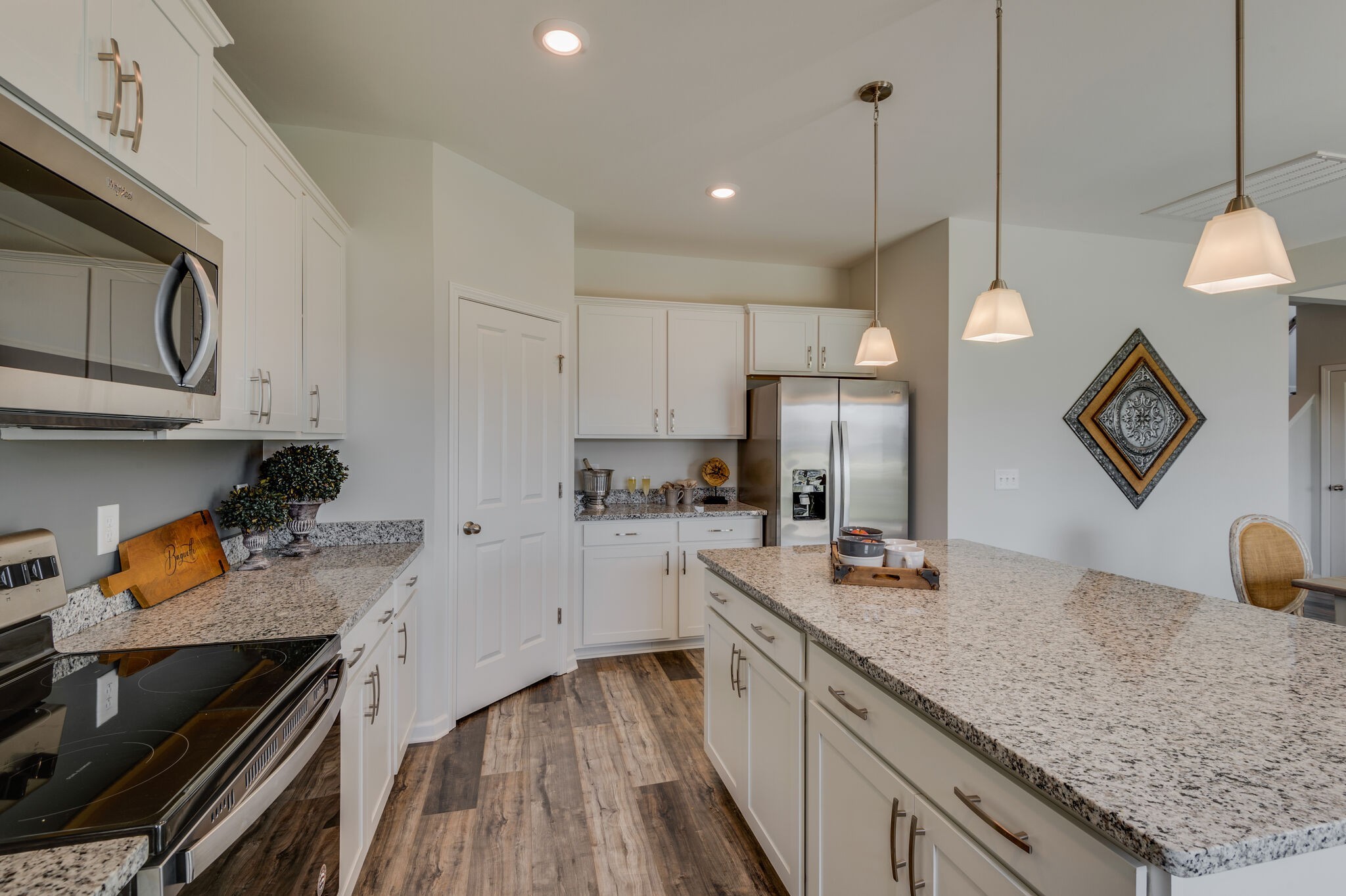 611 Castle Road Mount Juliet, TN 37122 - Photo 12 of 30 a kitchen with stainless steel appliances granite countertop a sink stove and refrigerator