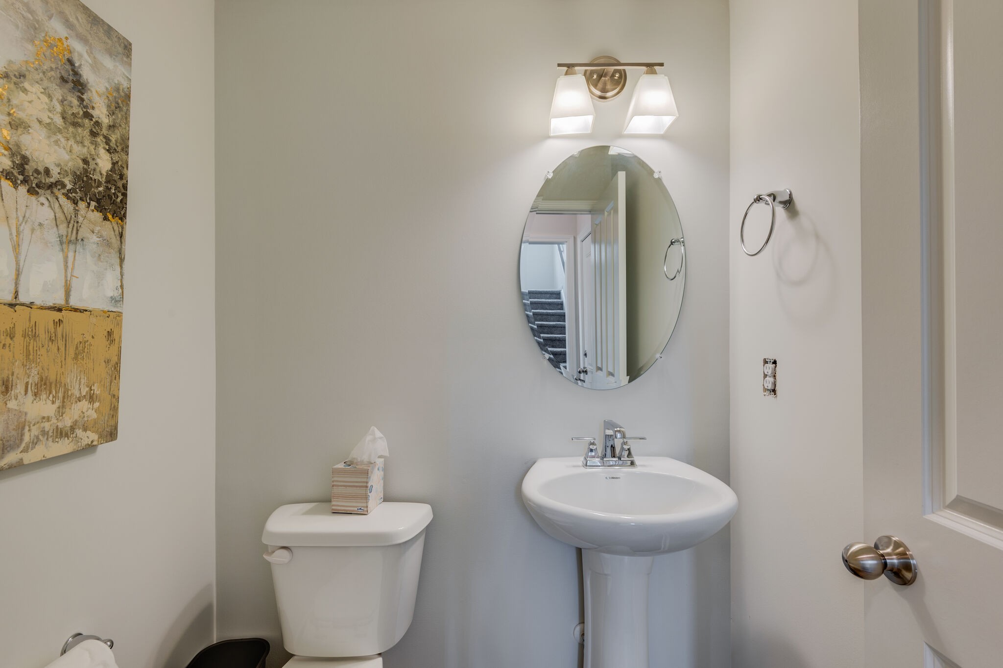 611 Castle Road Mount Juliet, TN 37122 - Photo 14 of 30 a bathroom with a toilet sink and mirror