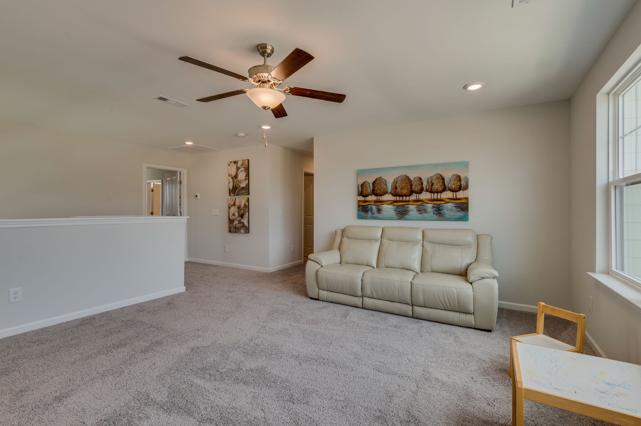 611 Castle Road Mount Juliet, TN 37122 - Photo 17 of 30 a living room with furniture and a chandelier