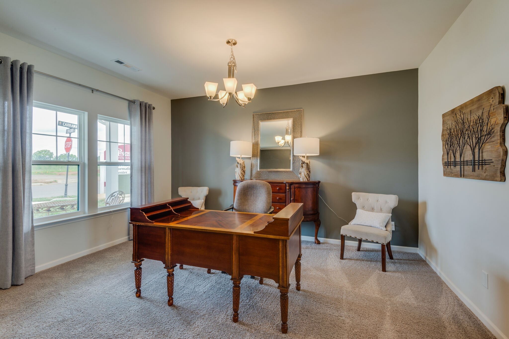 611 Castle Road Mount Juliet, TN 37122 - Photo 4 of 30 a room with furniture and a chandelier