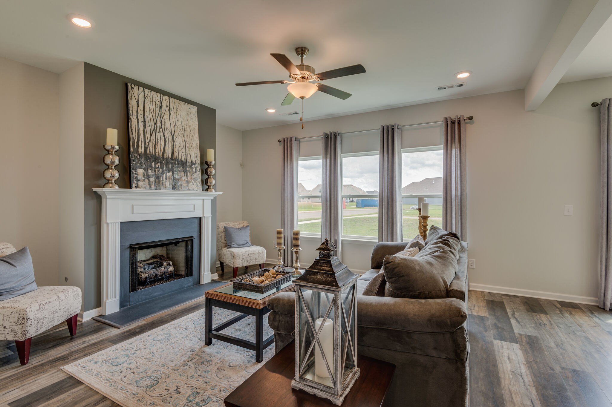 611 Castle Road Mount Juliet, TN 37122 - Photo 6 of 30 a living room with furniture and a fireplace