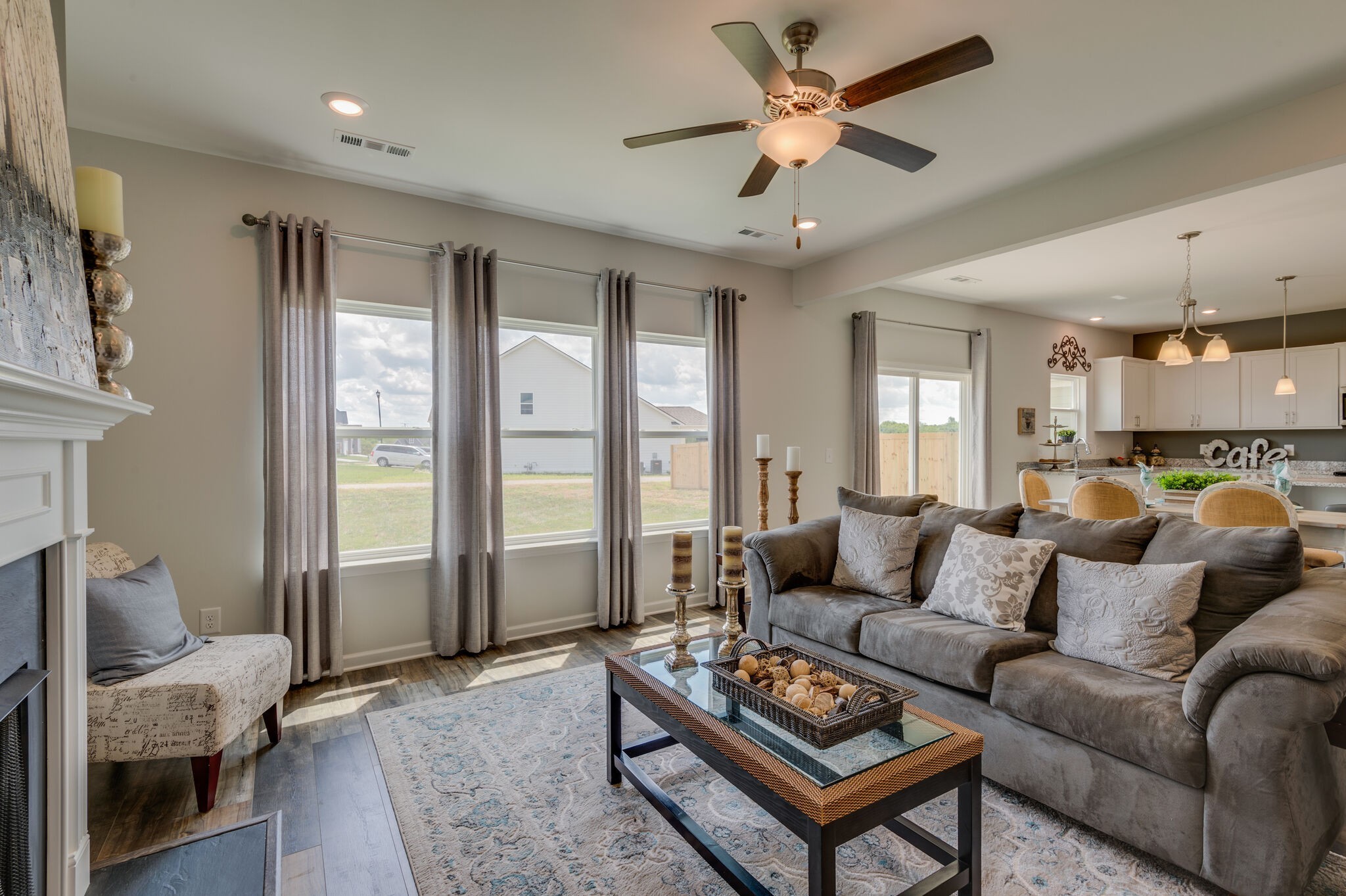 611 Castle Road Mount Juliet, TN 37122 - Photo 7 of 30 a living room with furniture ceiling fan and a window