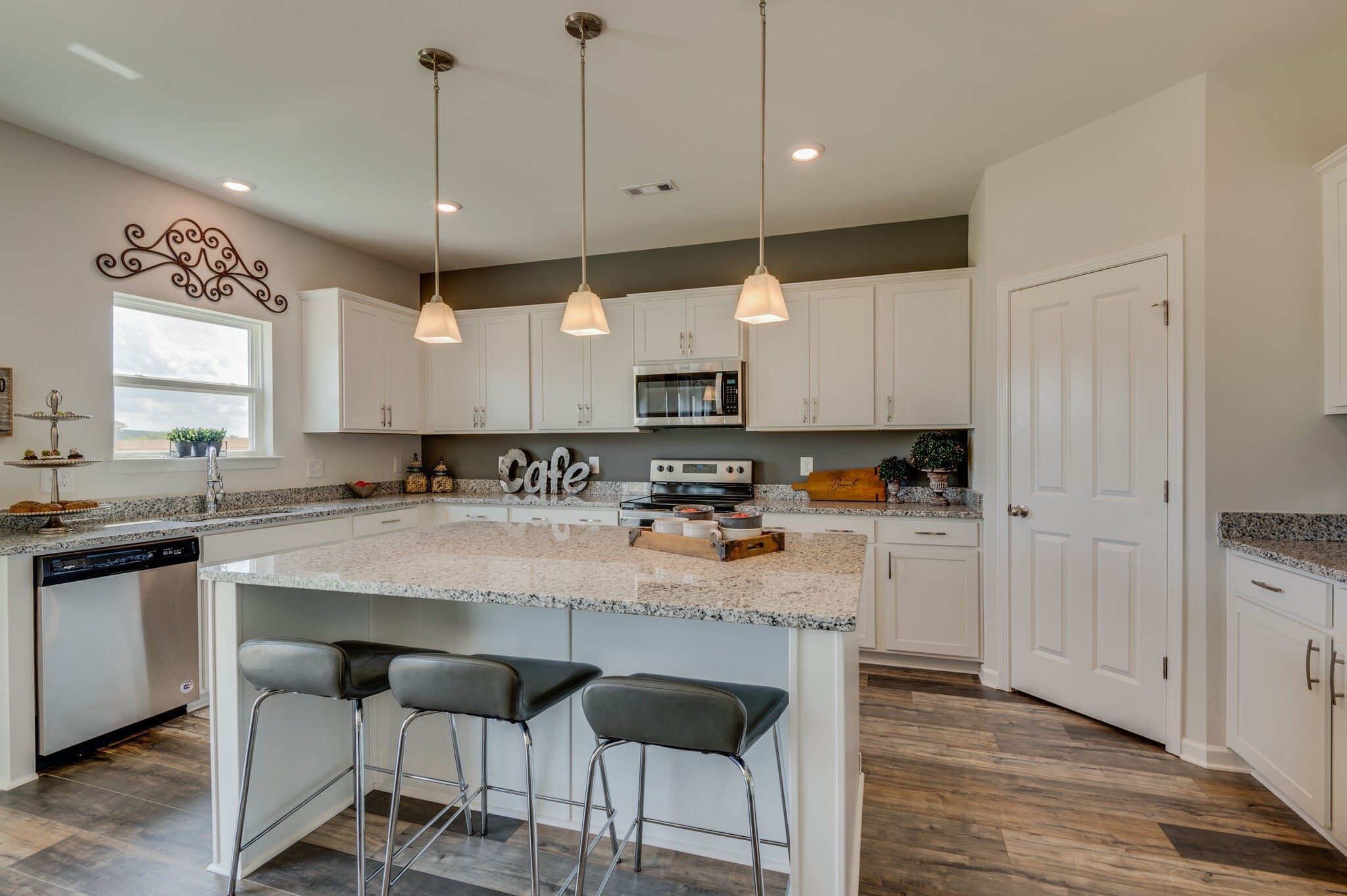 611 Castle Road Mount Juliet, TN 37122 - Photo 10 of 30 a kitchen with stainless steel appliances granite countertop a stove a sink and a refrigerator