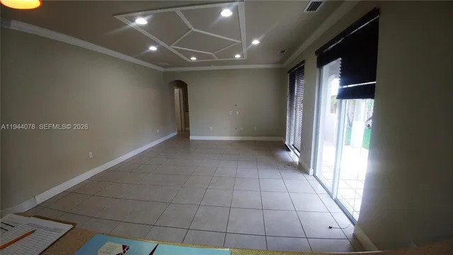 a bathroom with a toilet and a mirror