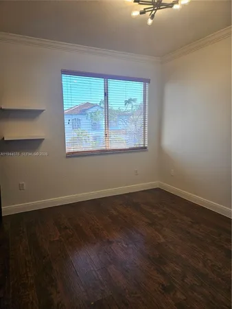 a view of a backyard with a garden