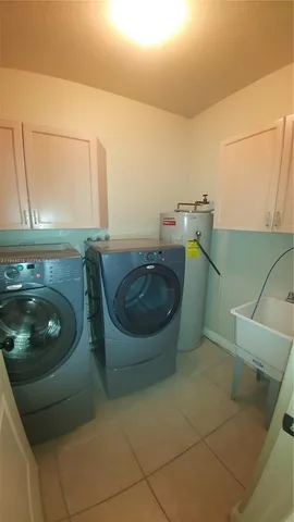 a view of an empty room with a fireplace