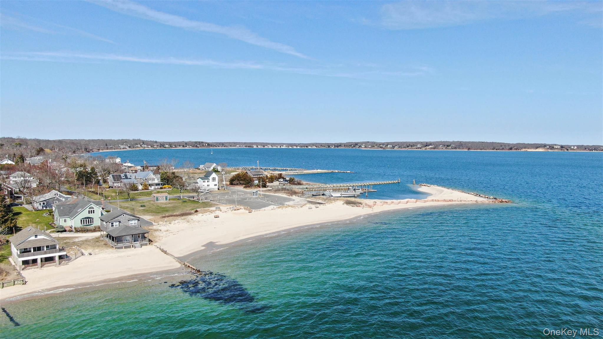 315 Wicks Road New Suffolk, NY 11956 - Photo 27 of 28 a view of an ocean and beach