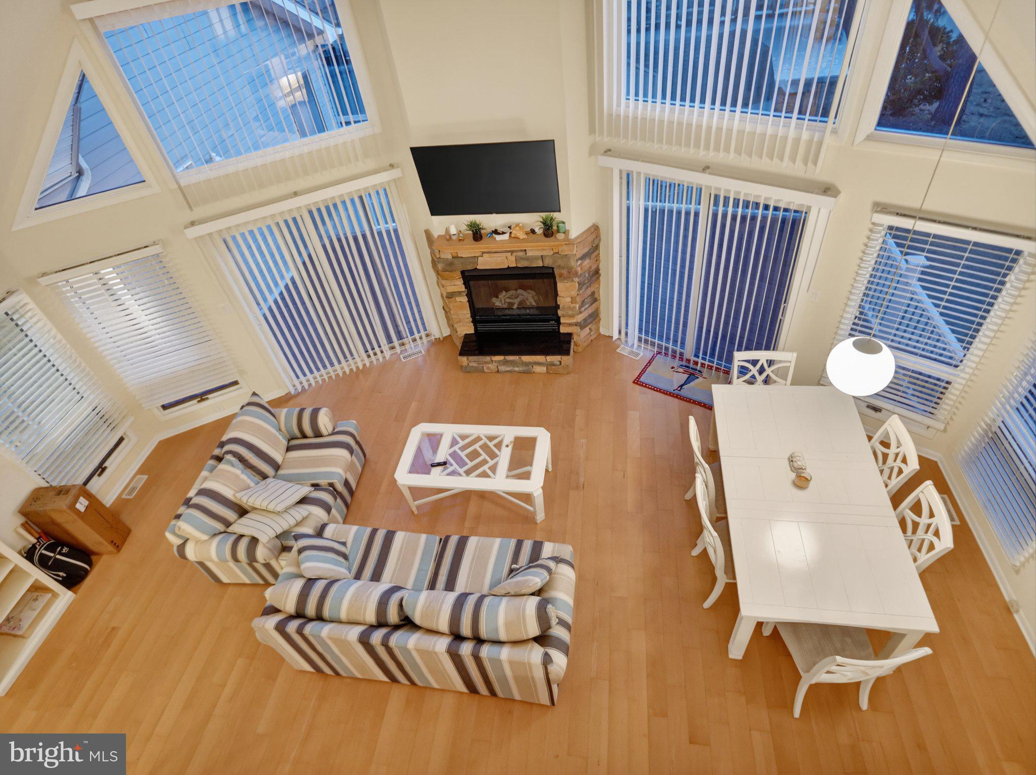 103 Channel Buoy Road Ocean City, MD 21842 - Photo 16 of 29 Bright, airy living space with charm.