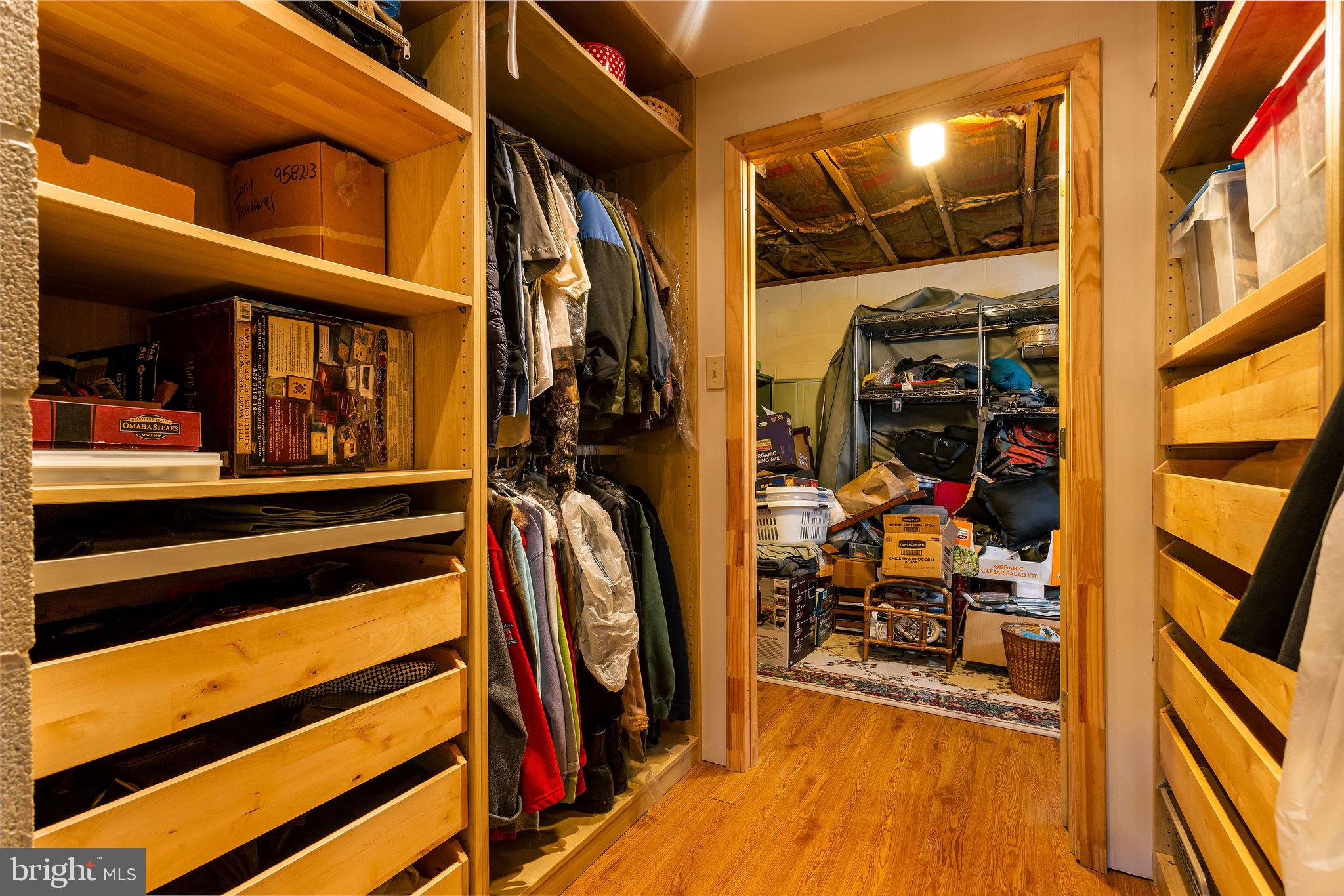 7108 Ridge Crest Drive Frederick, MD 21702 - Photo 40 of 51 Huge Closet from Bedroom 4 to Storage Space in LL