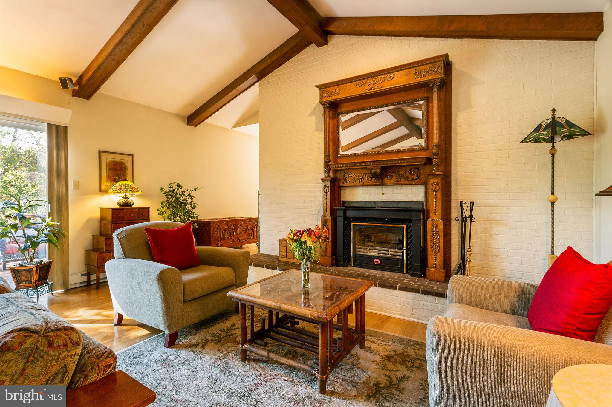 7108 Ridge Crest Drive Frederick, MD 21702 - Photo 7 of 51 Seating Area with Wood Stove Insert