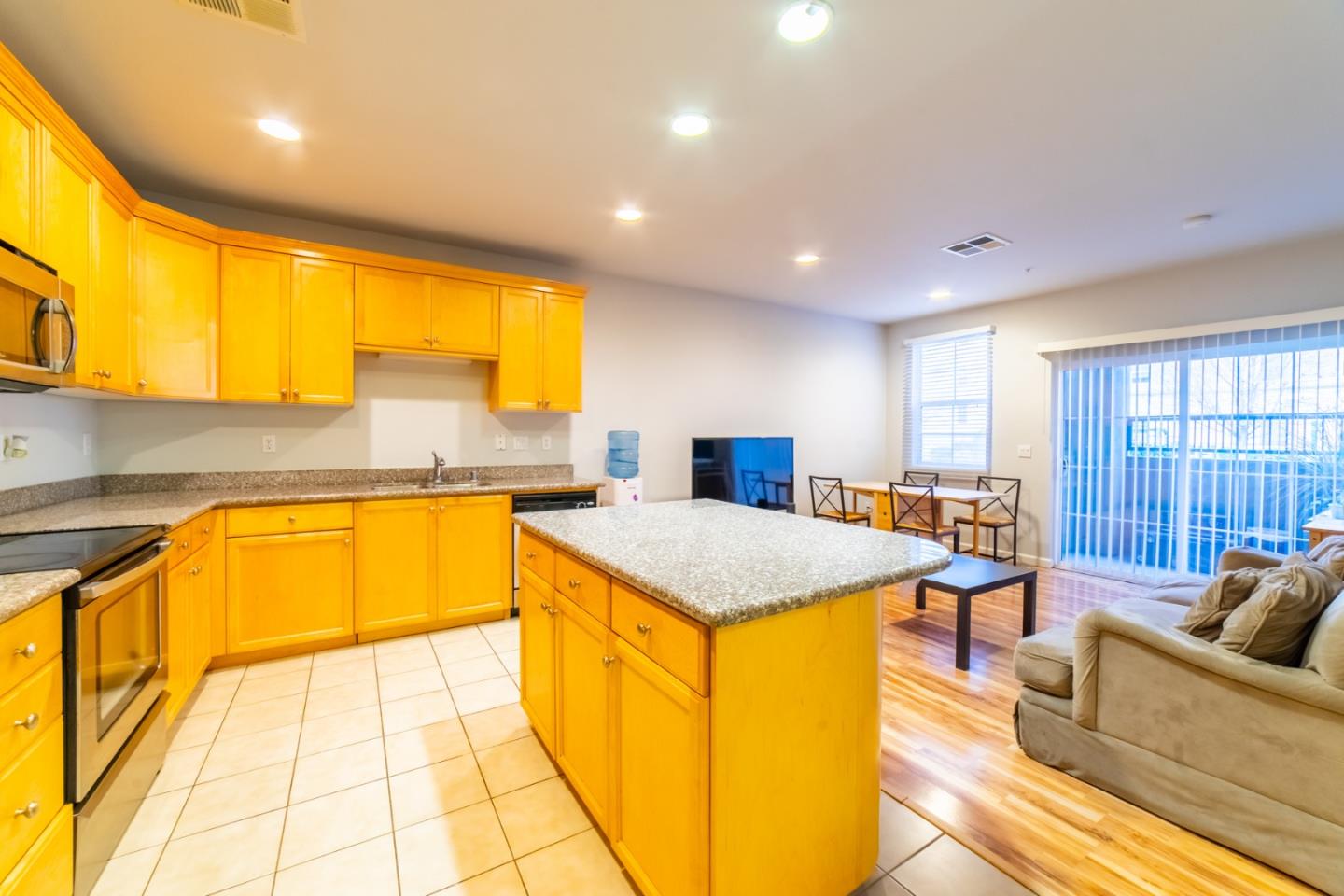 88 North Jackson Avenue, Unit 127 San Jose, CA 95116 - Photo 4 of 10 a very nice looking kitchen with a large window