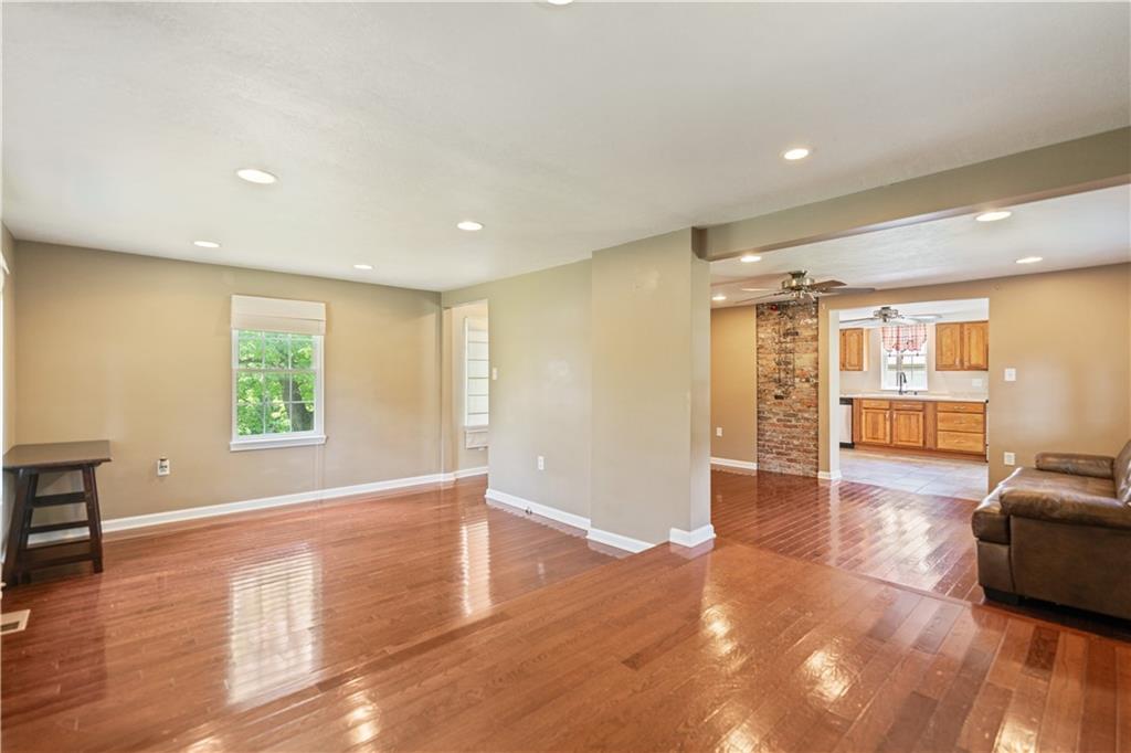 815 Arbor Ln Mount Mount Pleasant, PA 15666 - Photo 15 of 25 a view of a livingroom with furniture wooden floor and windows