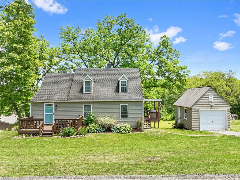 815 Arbor Ln Mount Mount Pleasant, PA 15666 - Photo 3 of 25 front view of a house with a yard