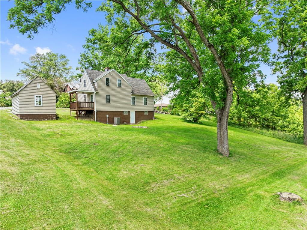 815 Arbor Ln Mount Mount Pleasant, PA 15666 - Photo 5 of 25 a view of a house with a big yard and large trees