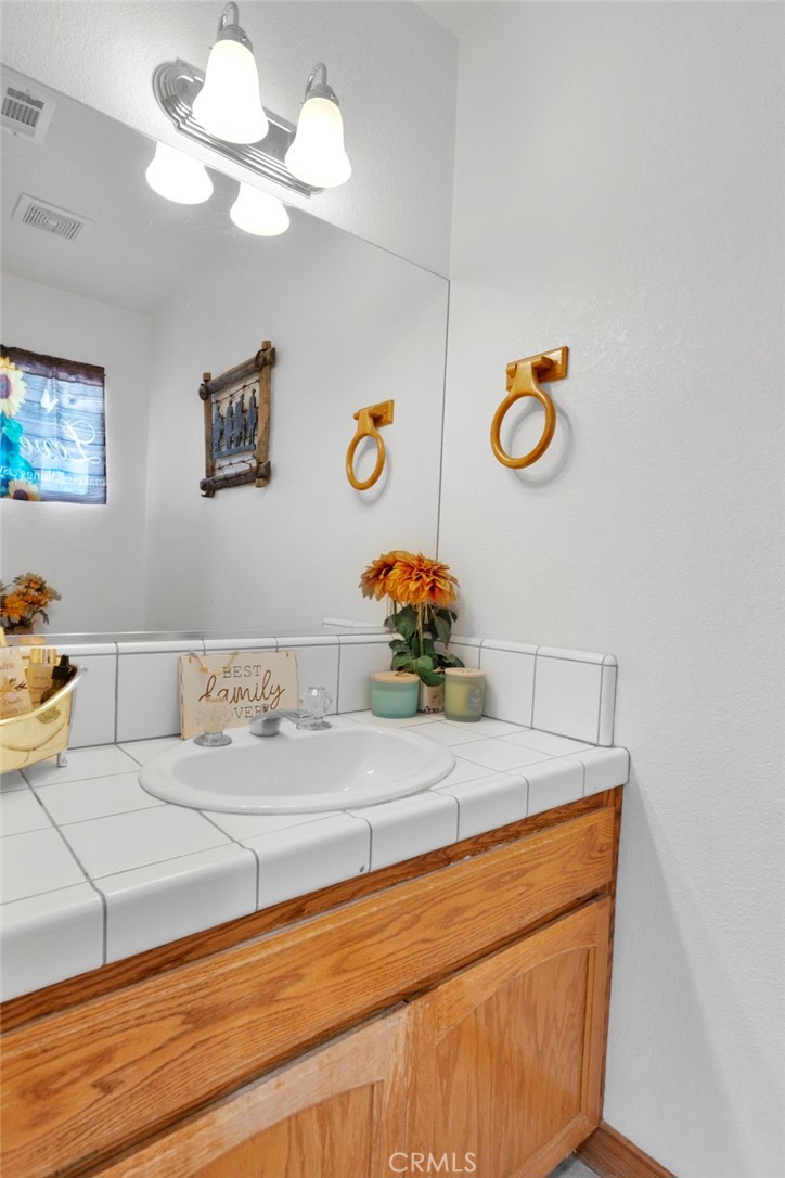 10276 Aster Road Oak Hills, CA 92344 - Photo 40 of 67 Half Bath