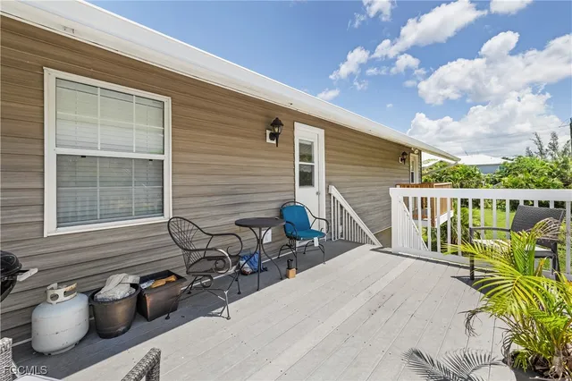 a view of a two chair in the balcony