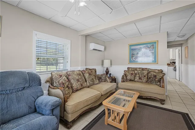 a living room with furniture and a couch